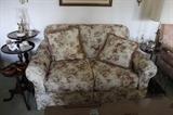 Set of three pedestal tables, floral love seat.
