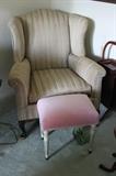 Arm chair with great frame. Pink foot stool.