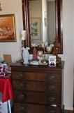 Antique four drawer chest and mirror.