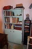 Two matching bookcases with shelves and cabinets. VHS tapes.