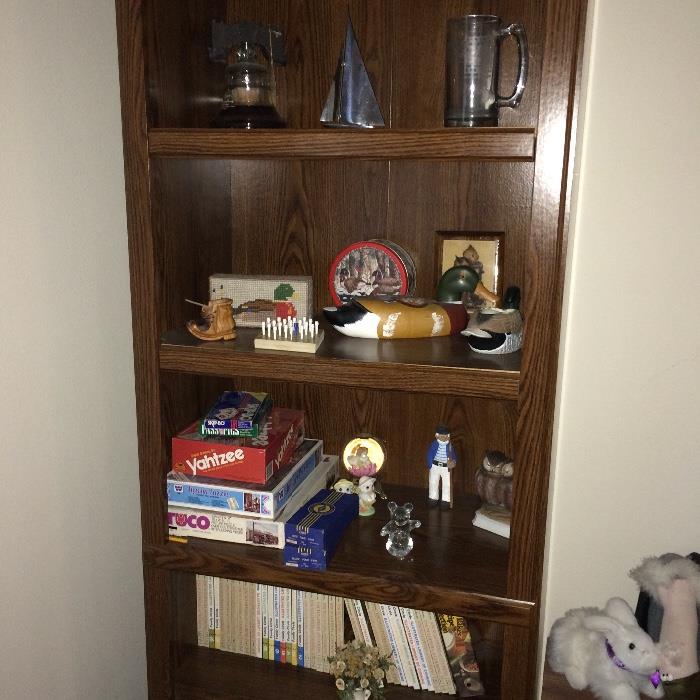 wood shelf unit, games, vintage magazines