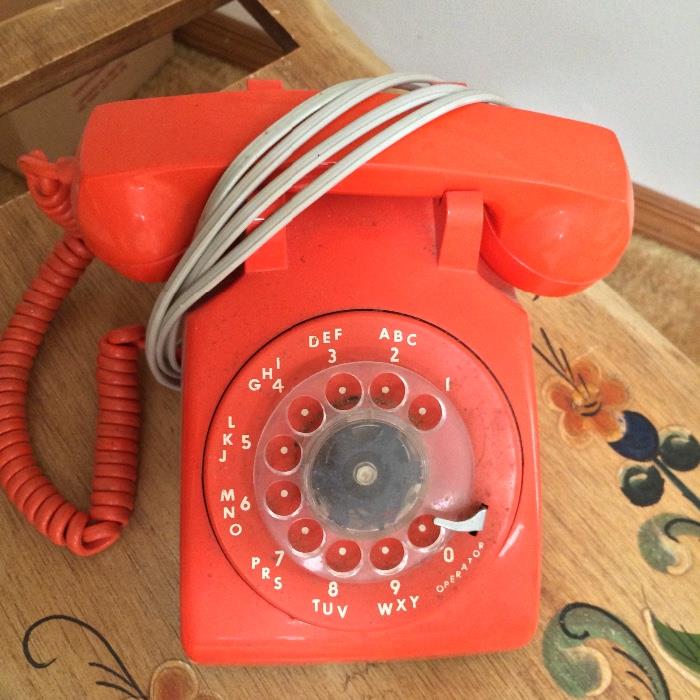 vintage orange rotary phone