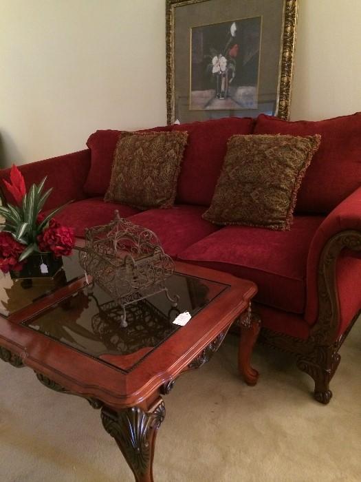      Exceptionally nice red camel back custom sofa, coffee table, and other decor