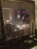        Framed art; wine rack; candle holders