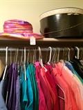      Variety of clothes, hats, & hat boxes