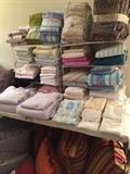        Many blankets, linens, & pillows