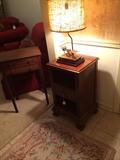             Small side table; "scale" lamp