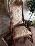 One of three antique rockers, plants, nice rugs