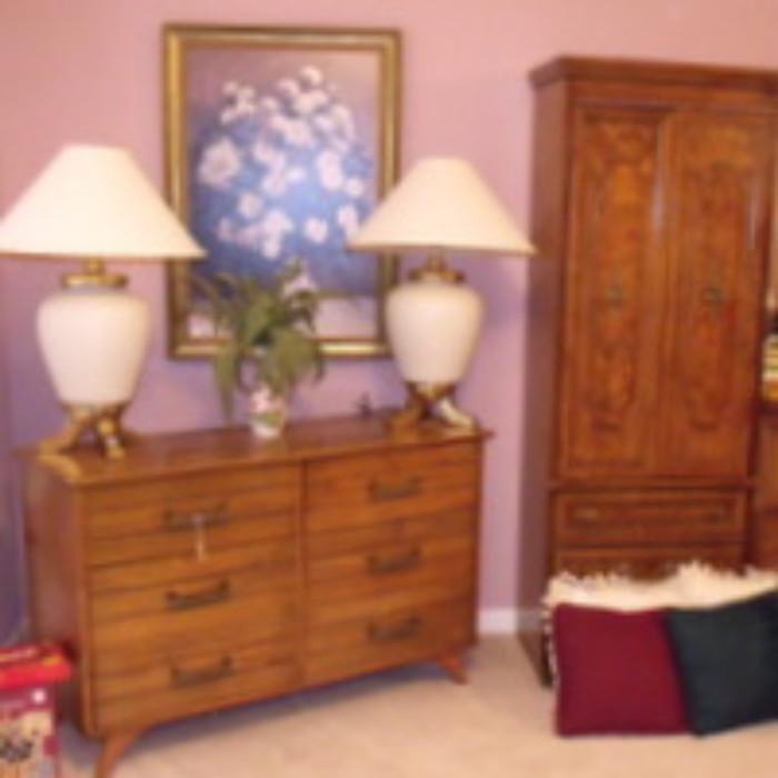 mid century dresser and many lamps and linens