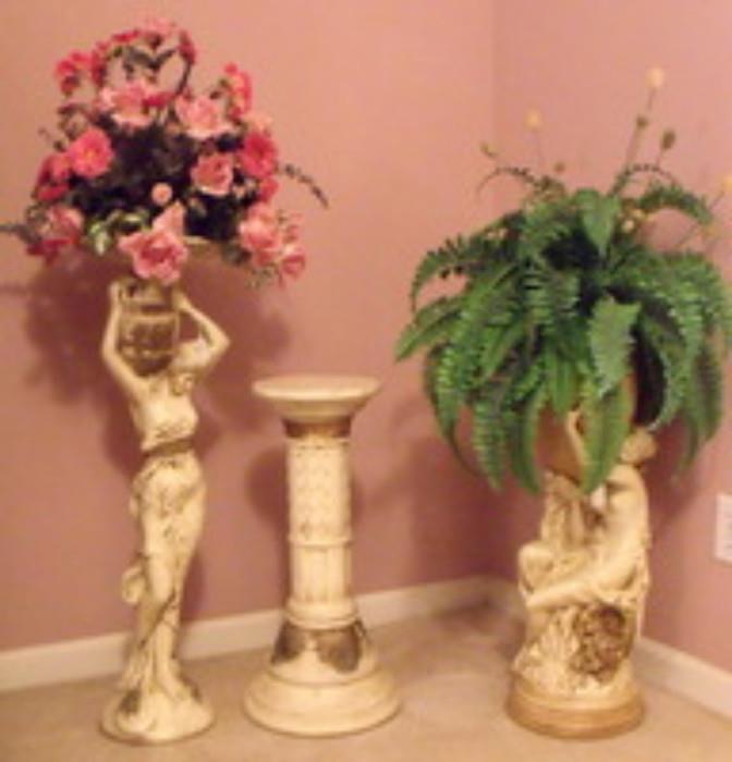 Decorative floral arrangements and statues