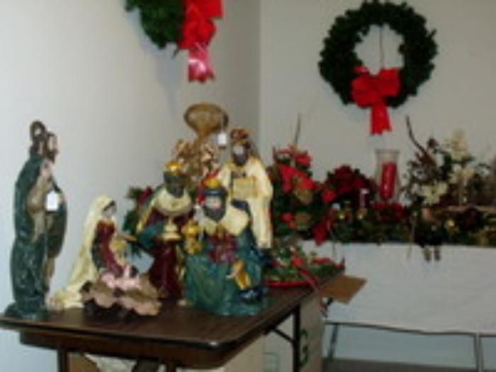 Large 7 piece manger scene and Christmas decorations and floral arrangements