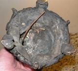 base of the bronze candle holders