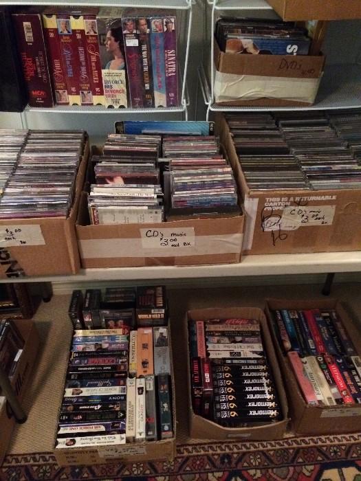 Large amount of cassettes, DVD's, records, & videos