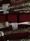     Many pieces of silver and silver plate flatware