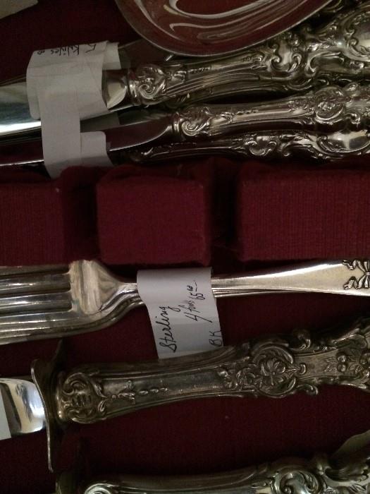     Many pieces of silver and silver plate flatware