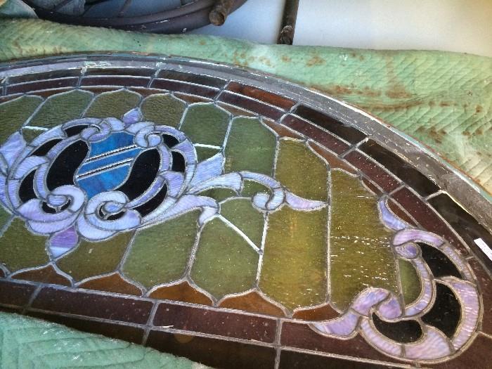         Beautiful stain glass window about 5 ft. wide