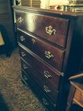 traditional cherry chest of drawers has a matching dresser
