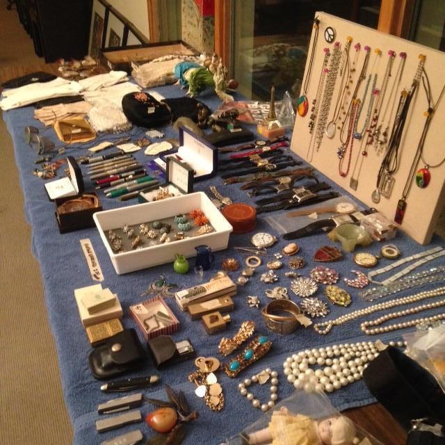 Tons of vintage jewelry. Watches and pens.