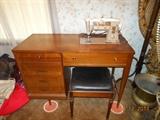 Singer vintage electric in cabinet