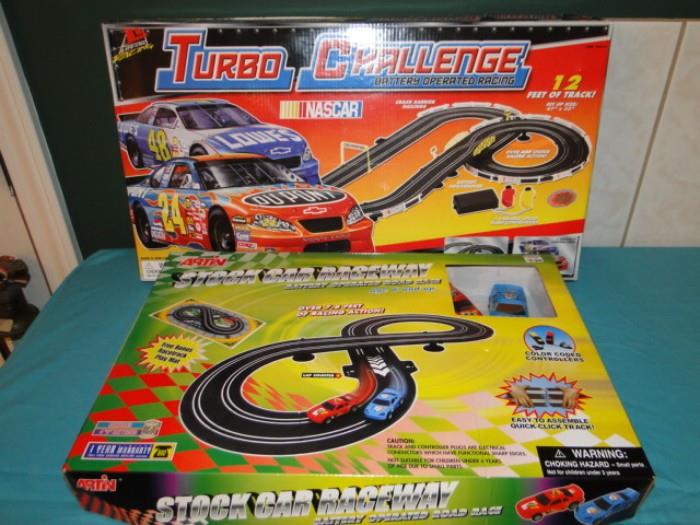 Race car sets never used!