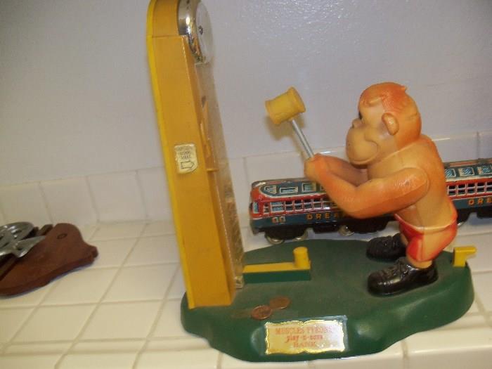 VINTAGE COIN OPERATED TOY - APE WITH MUSCLES