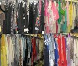 EVERY closet is packed... including a LARGE walk in closet.  Names include:
Oscar de la Renta, SAKS, Nordstrum, Pierre Cardin, Albert Nippon, Sue Wong, St. John, and many others!