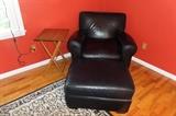 CRATE AND BARREL BLACK LEATHER CHAIR WITH OTTOMAN