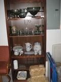 wooden shelf unit with pretty glassware from Mexico
