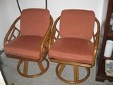 2 of the four rattan swivel chairs