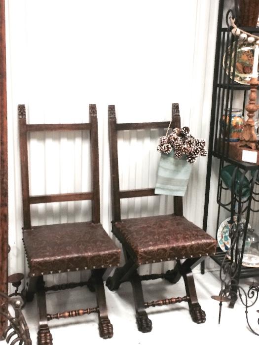 1800 Spanish solid mahogany carved chairs with original embossed leather seats with family crest in the middle. Spectacular for a wine cellar.