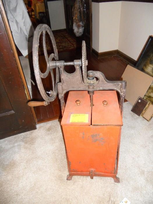 Very old metal butter churn