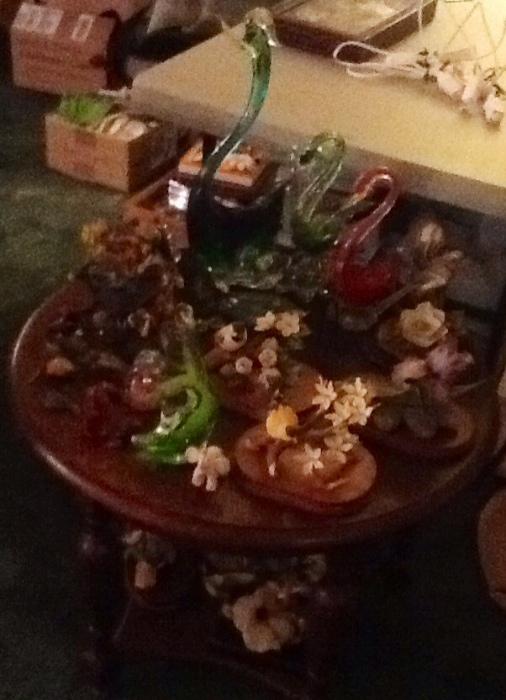 Great occasional table filled with collectibles 