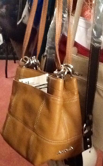 Tignanello leather purse with tags