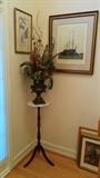 decent artwork, marble-topped stand, OK "silk" flower arrangement