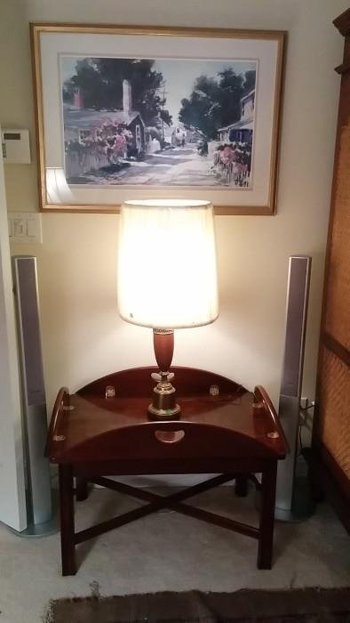 Nice mahogany tray table, with basic lamp and two of the five-speaker surround sound speaker system 