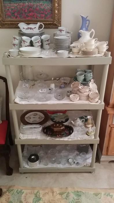 Exhibit one of several tacky shelving units, Ok, they're light and easy for us to transport, don't hate. Christmas china, just in time for, yes, CHRISTMAS!