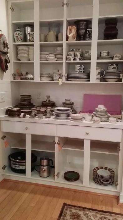 More sets of china, counter-top appliances, keep looking, you'll see it!