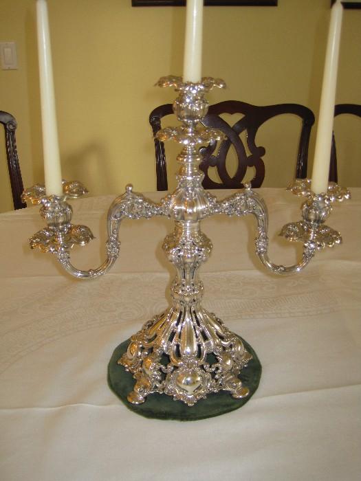 A stunning pair of Reed and Barton Renaissance Candelabras.