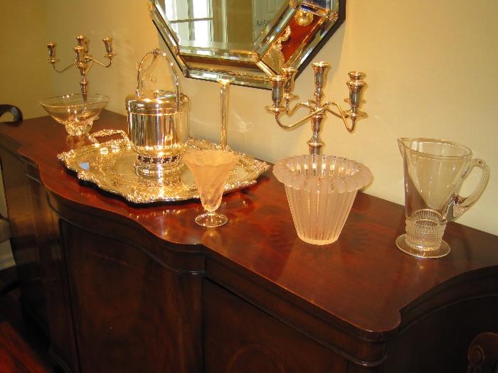 Crystal pieces by Lalique and Steuben. A pair of Sterling candelabras. 