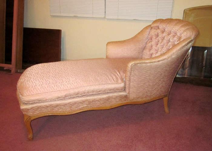 Vintage chaise lounge with original fabric (pink w/gold flecks), hardwood frame, tufted back.