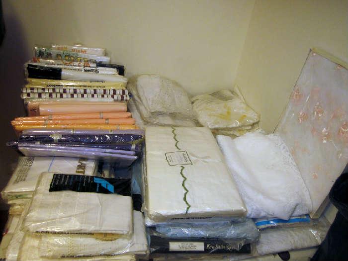 Bed linens, mostly new in packages