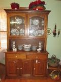 Oak china hutch with leaded glass doors