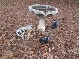 Concrete bird bath, mother cow with calf, rabbits