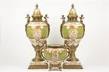 LOT 9: A GILT METAL MOUNTED PORCELAIN GARNITURE