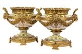 LOT 10: A PAIR OF GILT METAL MOUNTED PORCELAIN URNS