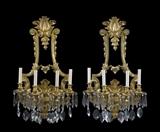 LOT 11: A PAIR OF CONTINENTAL GILT METAL FOUR-LIGHT SCONCES 