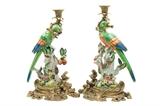 LOT 15: A PAIR OF GILT METAL MOUNTED PORCELAIN FIGURAL CANDELABRA