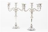 LOT 100: A PAIR OF SILVER-PLATE FIVE-LIGHT CANDELABRA