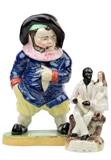 LOT 111: TWO ENGLISH STAFFORDSHIRE PORCELAIN FIGURAL ARTICLES