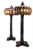 LOT 115: A PAIR OF COPPER AND TEAKWOOD FLOOR LANTERNS
